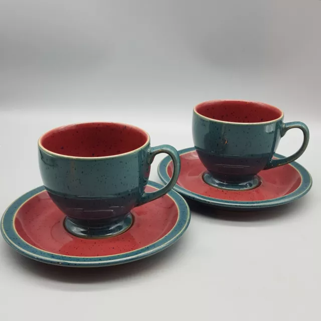 Pair of Denby Harlequin Cup & Saucer Sets. Red & Green w/ Blue Speckles England