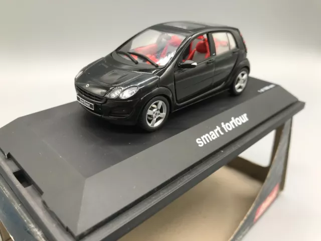 Modellautos 1:43 Schuco Smart Forfour 04694  mit OVP