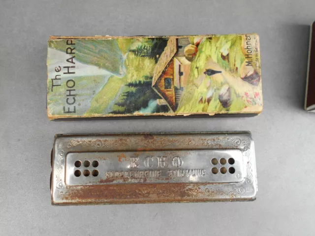 Ancien harmonica M HOHNER The Echo Harp dans sa boîte.