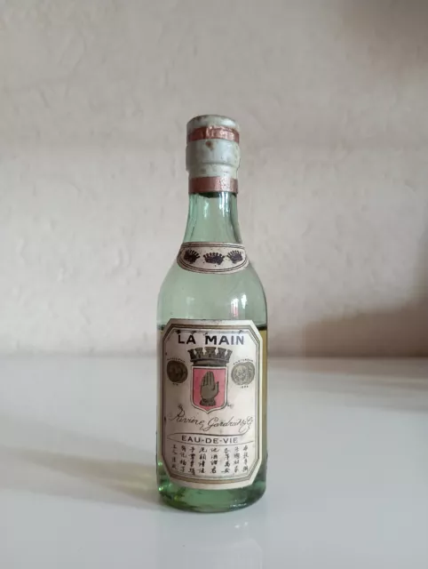 Very old mini bottle cognac/eau de vie Riviere Gardrat 3 crowns export China 5cl