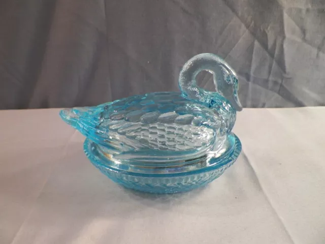 Wilkerson Blue Glass Swan on the Nest Covered Candy Dish - Glows Orange