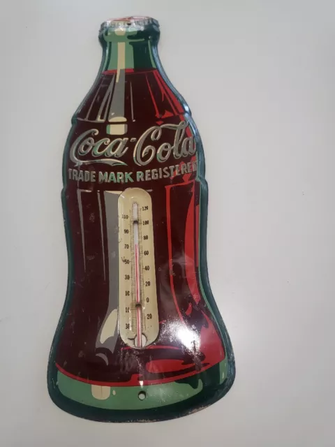 Vintage original coca cola nineteen fifty's wall thermometer works very clean.