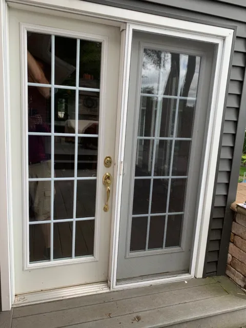 French Patio Doors with screen. White with brass hardware