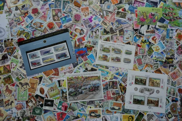 (LOT-VRAC 443) 1000 très beaux timbres du monde (photo dans le texte)