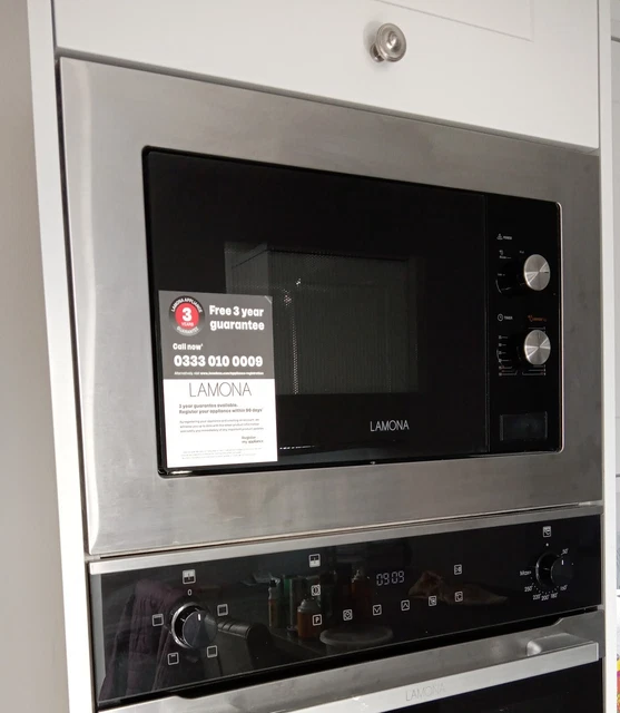 HOWDENS LAMONA BUILT in Microwave Oven only used for three weeks exc