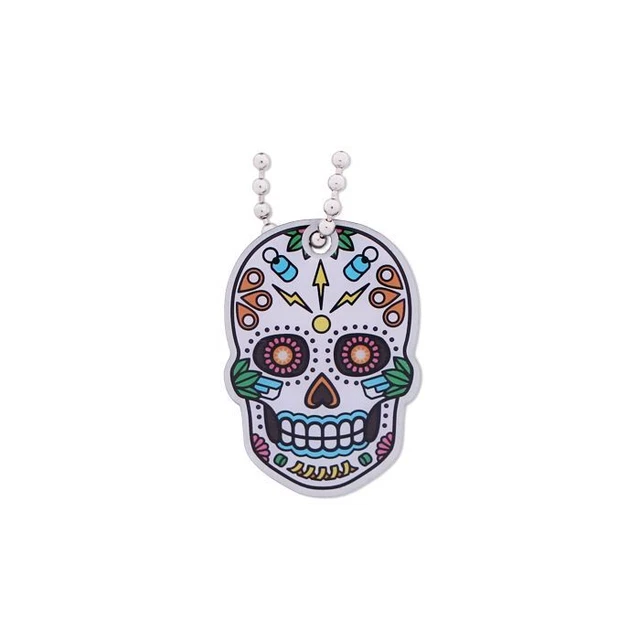Geocahing traveltag Travelbug Tête de Mort Día De Muertos travel tag