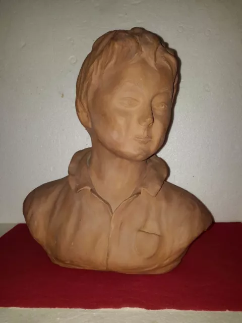 Buste d'enfant en terre cuite signé "20ème"