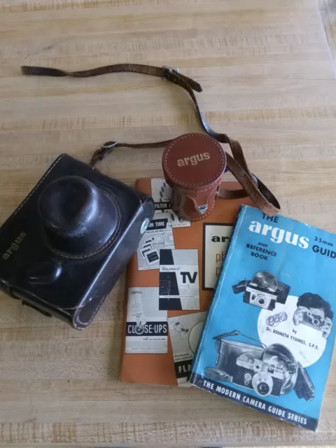 argus 35mm camera, case, telephoto 100mm lens, owners manual