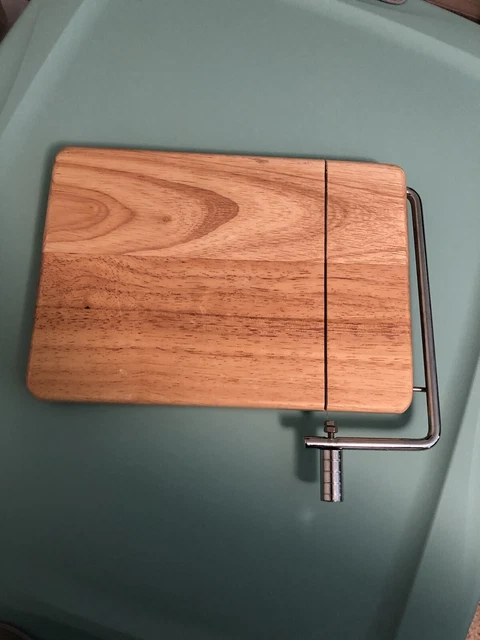 Cheese slicer cutting board