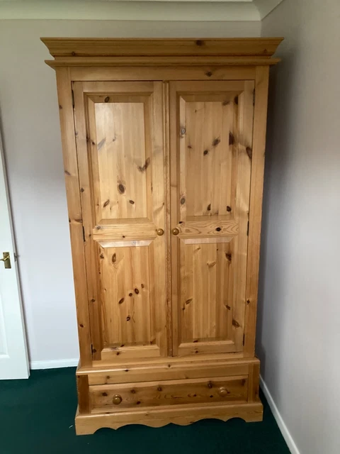 Used 2 door Pine wardrobe with hanging rail and single drawer good condition