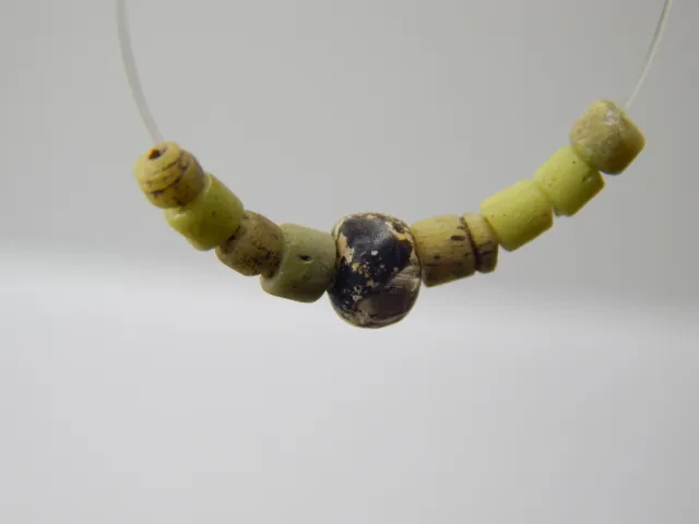 Ancient Roman Beads of Yellow and Black Glass 9 pcs