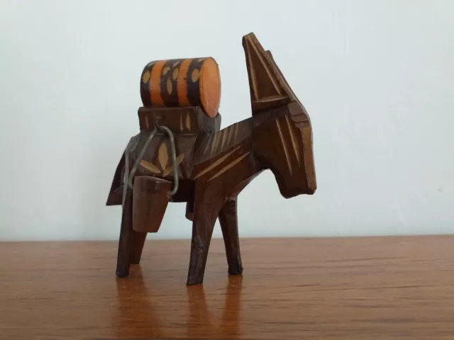 A Midcentury Stylized Carved Wooden Donkey Figurine.