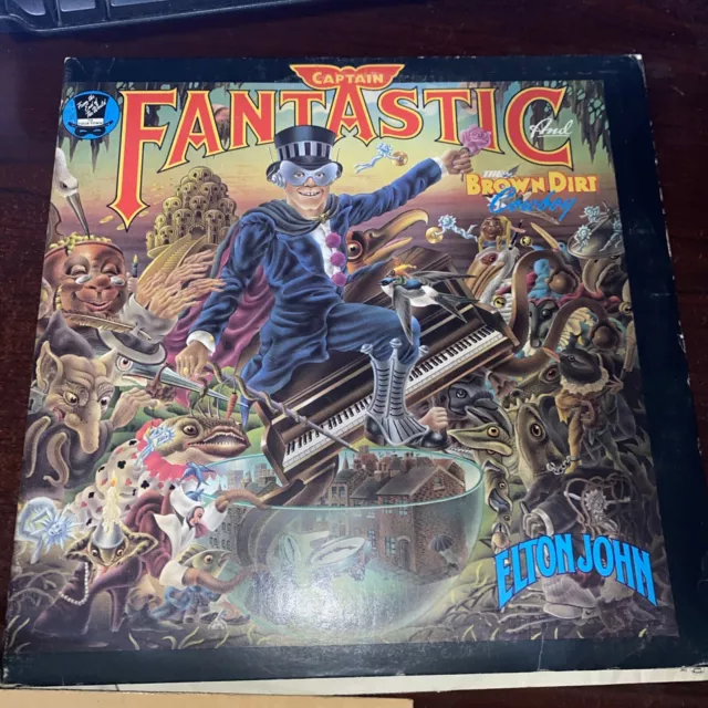 Elton John/ Captain Fantastic &Brown Dirt Cowboys, Poster & Books Inc, SVG Con,