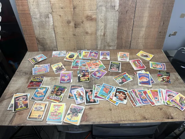 https://www.picclickimg.com/zvsAAOSwzmVllb3r/Vintage-Garbage-Pail-Kids-Cards-Mixed-Lot-Of.webp