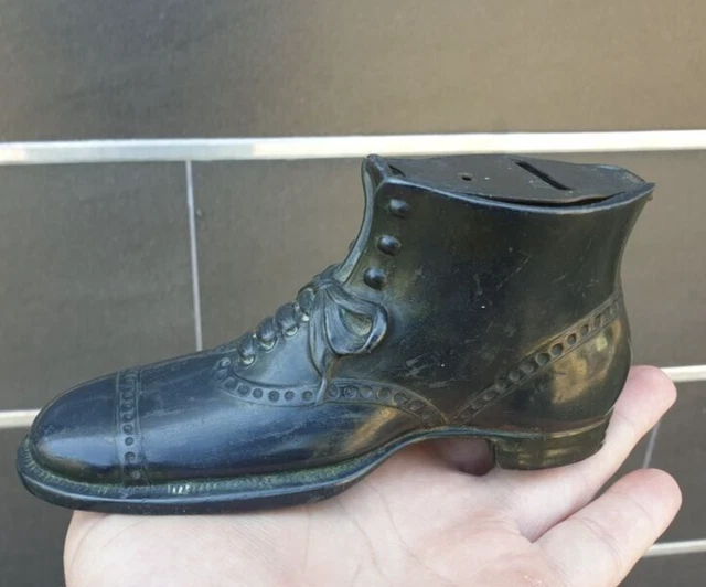 Pre-war metal piggy bank in the shape of a shoes
