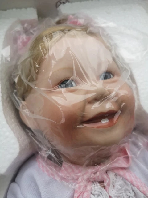 Ashton Drake 'Cute as a Button' porcelain baby doll.  Boxed with certificate