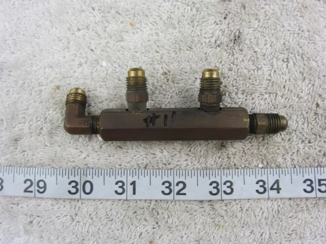 Brass Nipple 4-Wat Flare Schrader, Used