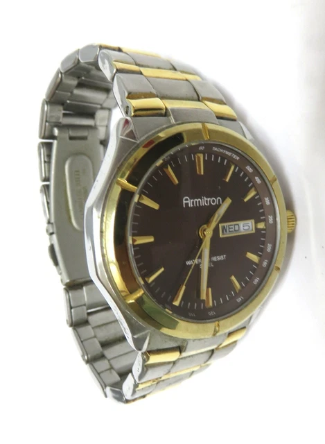 Armitron Men's Silver with Gold Accents Black Dial Day/Date Watch, New Battery