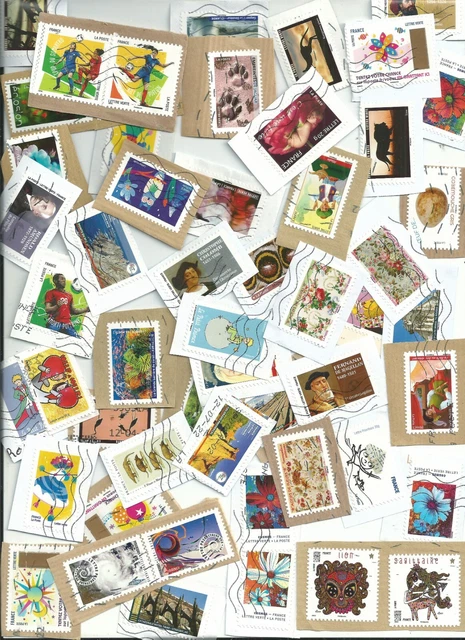 Joli lot de 100 timbres adhésifs oblitérés sur fragments tous différents (L1)