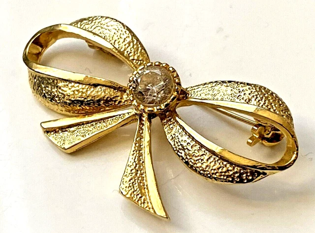Broche dorée vintage avec grand nœud - France