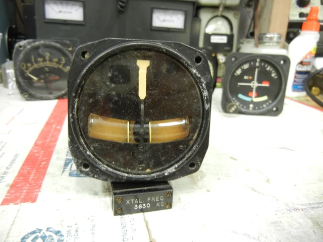 Bendix 1718-2S-A2 turn and bank indicator: Tubes plugged, no Radium. Bendix 1718-2S-A2 turn and bank indicator: Tubes plugged, no Radium.