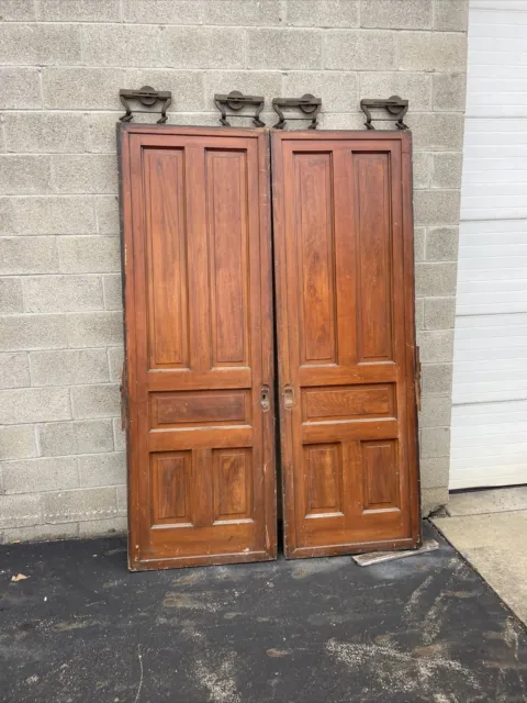 CM 789 pair antique wood grained pocket doors 61 x 89.75 x 2.25.