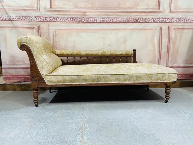 Victorian Mahogany carved framed gold upholstered chaise longue