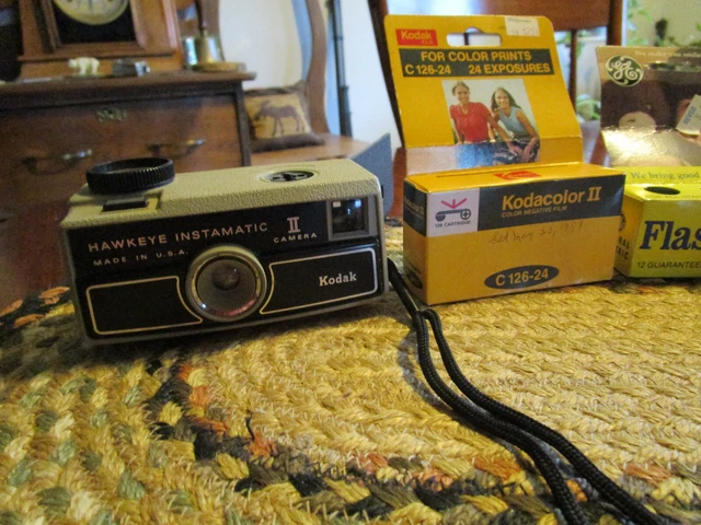 Two Vintage Kodak Hawkeye Instamatic 2 Cameras with  Flashcubes and film.