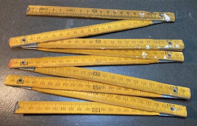 https://www.picclickimg.com/~18AAOSwr1lllnVi/Vintage-Wooden-Folding-2-Metre-Ruler-Measure-Nice.webp