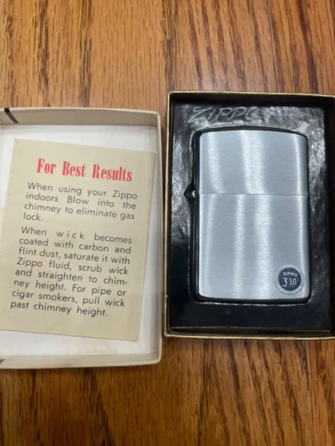 1964 Zippo lighter Brushed chrome NO.200 Unfired with original Price tag