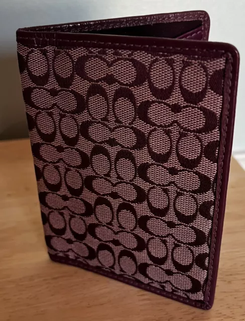 Coach Signature C Canvas Passport Holder With Purple Leather Trim