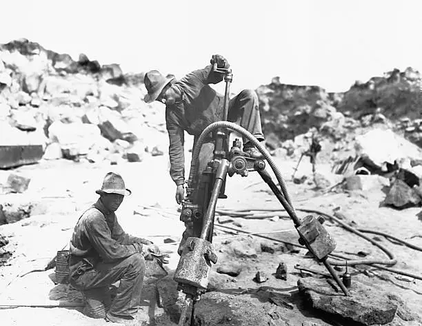 Class 'E9' Ingersoll drill at work in diversion channel. Minidoka - Old Photo