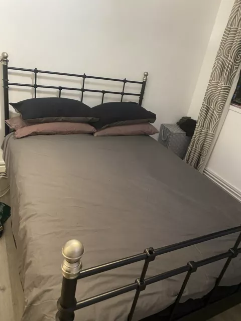 used black metal double bed frame