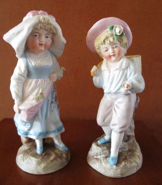 Pair Of German Conta And Boehme Bisque Porcelain Boy & Girl Figurines