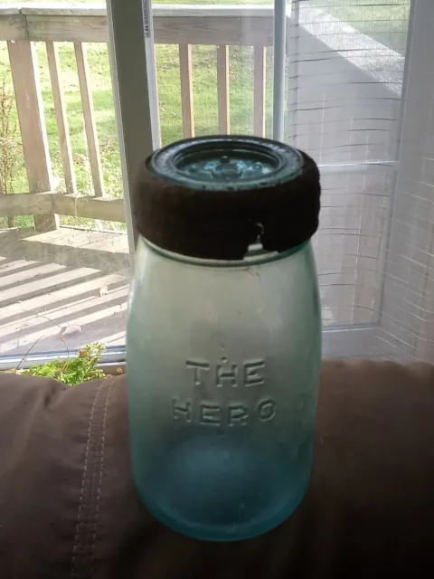 Blown ground top fruit jar, The Hero
