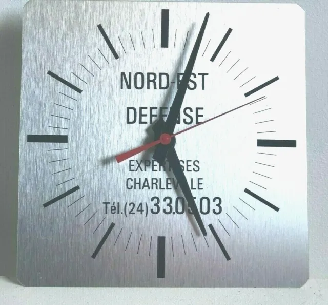 Ancienne horloge publicitaire 60-70 métal "NORD EST DEFENSE " industriel NO COPY