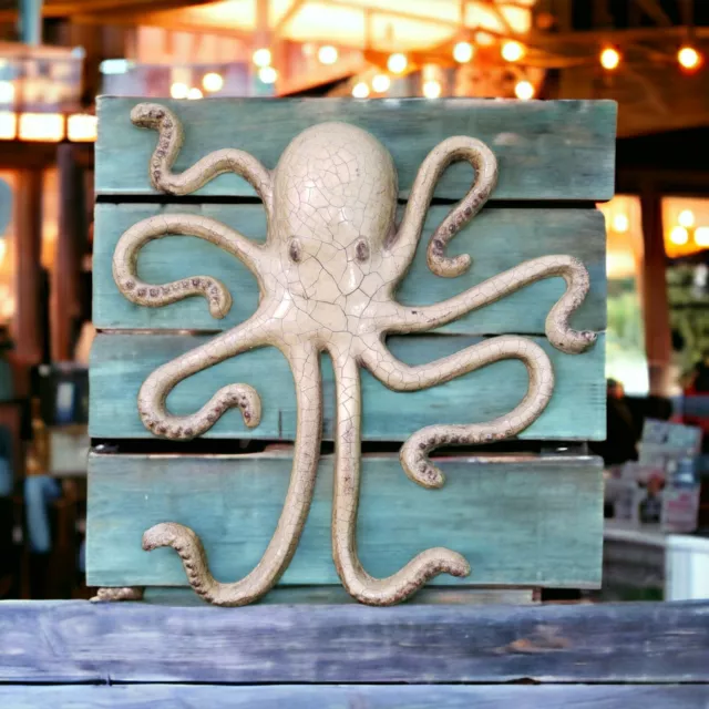 Large cast iron octopus wall hanging with yellow crackle glaze Tiki Bar Decor
