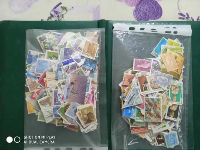 Lotto di 1030 francobolli mondiali viaggiati