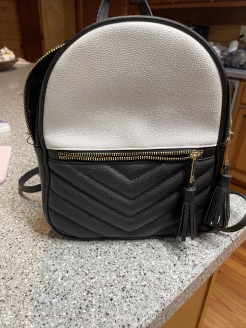 Preowned Claire’s Backpack Purse Black White