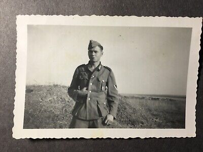 Original WW ll German Army photo. German Soldier thinks he’s Napoleon.