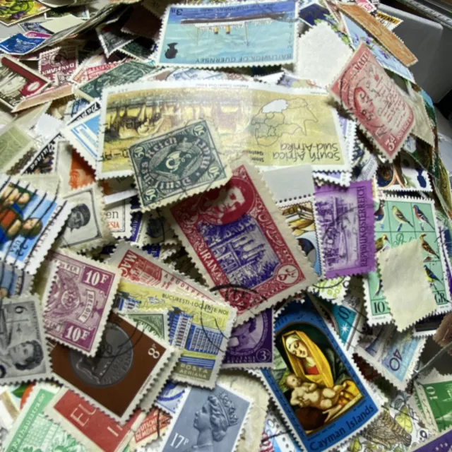 75 each world stamps off paper from large collection