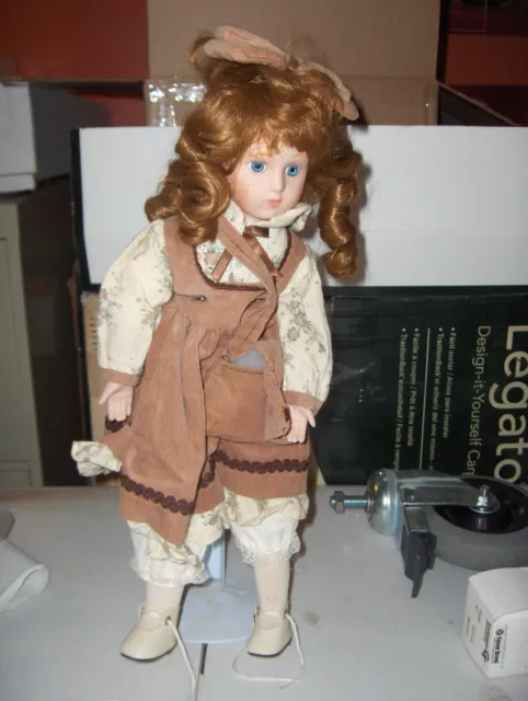 The heritage mint ltd collection 16 inch  porcelain doll . Vintage