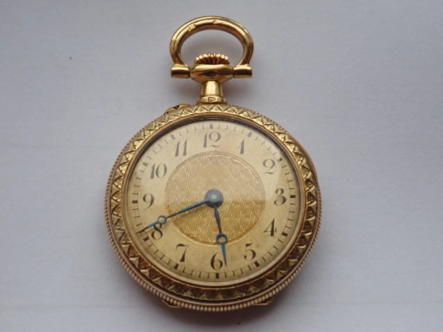 ANCIENNE MONTRE À gousset en or 18 K avec diamant en son centre