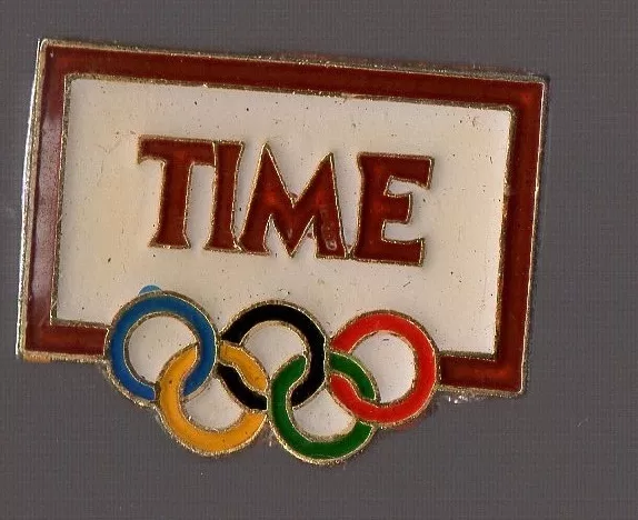 Pin's journal Time (sponsor des jeux olympiques) / qualité zamac