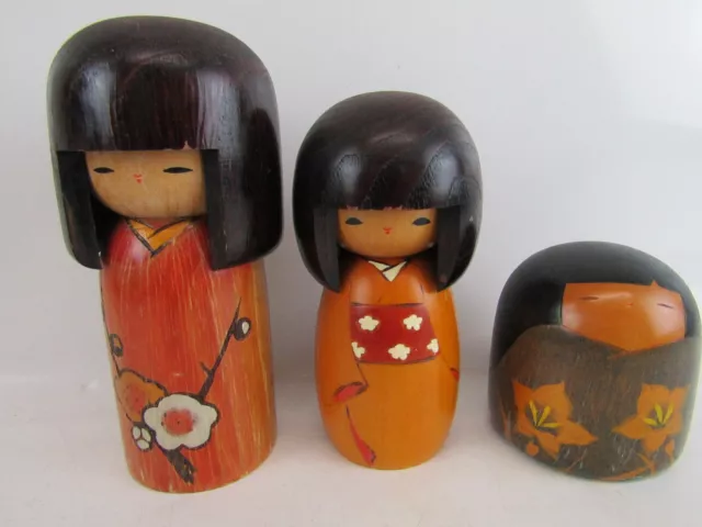 Set Of 3 Wooden Japanese Kokeshi Dolls Heights 16cms 13.5cms And 8cms