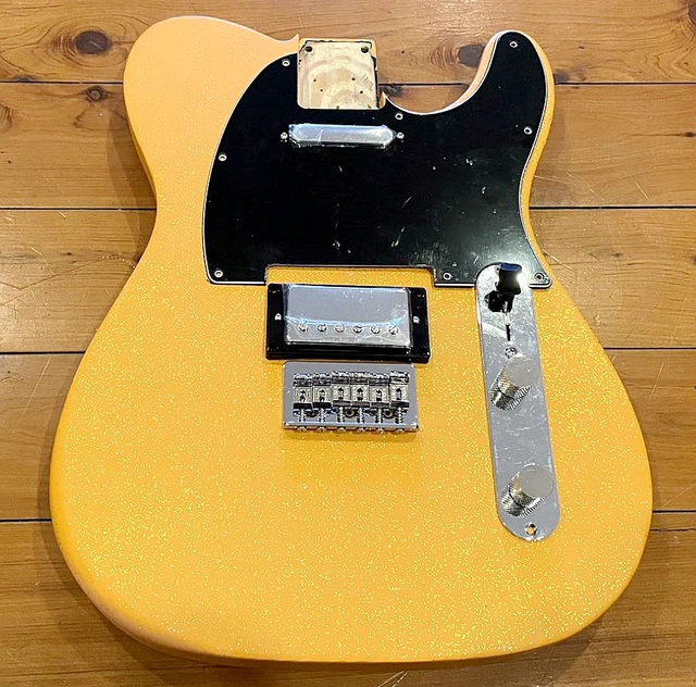 Loaded clearance tele body