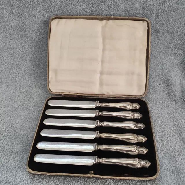 Boxed set of silver plated knives