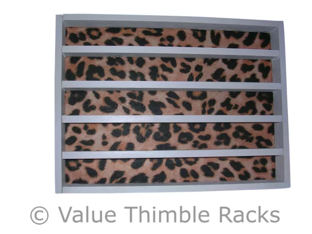 50 thimble display rack in white with a cheetah  themed felt back/animal print