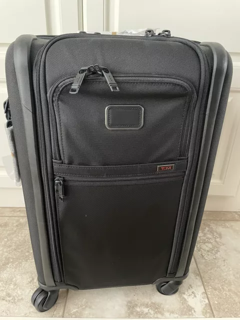 Tumi International 4 Wheeled Carry On Luggage - Black 22"