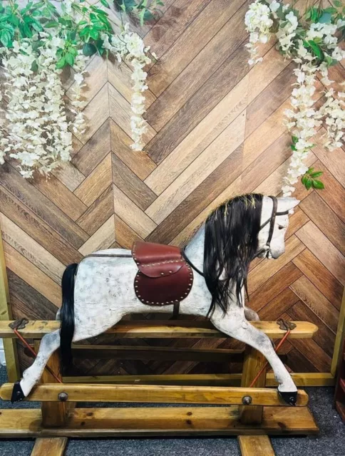 large wooden vintage rocking horse